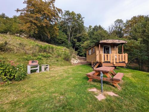 Ferdrupt House | Roulotte cosy avec kitchenette, ruisseau apaisant et espace bien-être, nuit insolite à Ferdrupt - FR-1-589-444