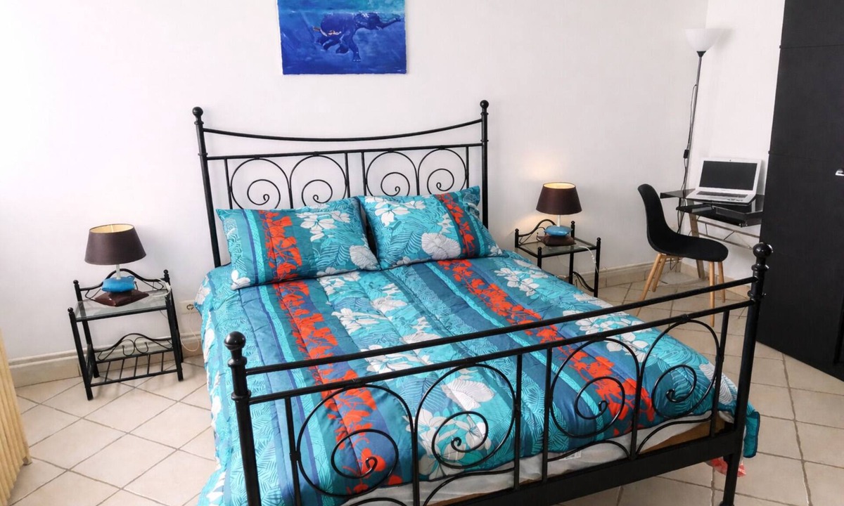 Paroisse Saint-Vincent-de-Paul Apartment | Vacation rental Dole le Comté 3 sleeps wifi parking terrace patio