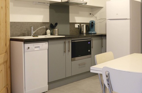 Up 1.5 Saint-Ferreol Apartment | A new apartment with old-world charm in the center of Besançon.