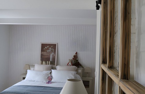 Charols Bed & Breakfast | Air-conditioned “Lavande” Guest Room on Garden Level with Mountain View