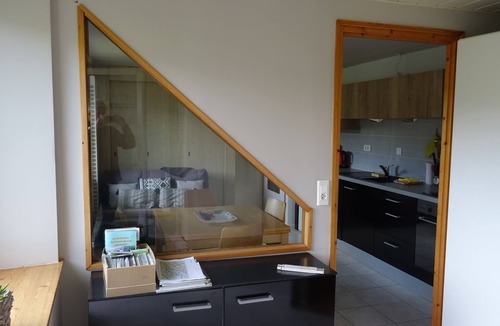 Villers-le-Lac Apartment | "Balcony overlooking the Doubs Basin and the Swiss village of Les Brenets