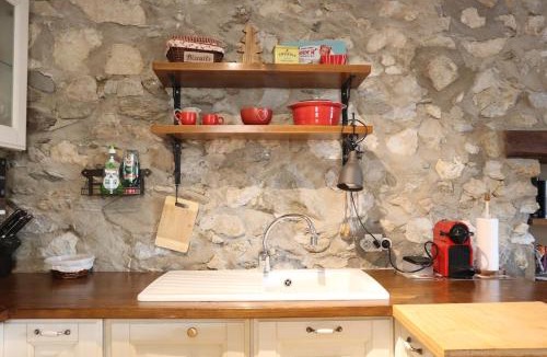 Llo Ski Chalet | Cal Gano, 3-Story Stone & Wood Mountain Retreat