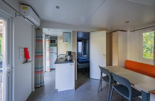 Clairvaux-les-Lacs House | Campsite Le Fayolan* - Mobile home Comfort 4 rooms 6 people air-conditioned