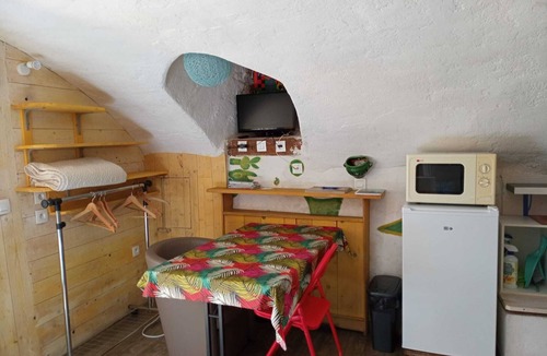 Yzeron Apartment | Cosy, vaulted studio with terrace