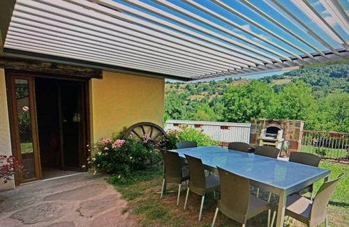 Villecomtal House | Holiday Home 'Domaine De Jouani - Pergola' with Shared Pool, Private Terrace and Wi-Fi