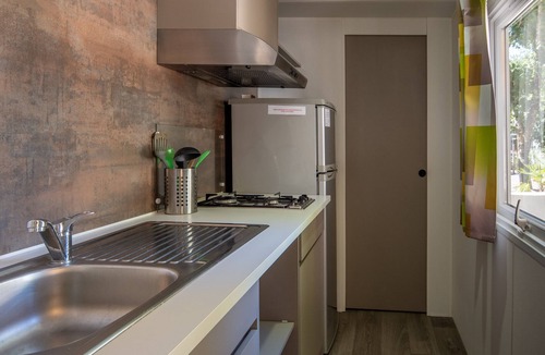 Lavilledieu RV Rental | Mobile Home 'Confort B - 1-5 Persons' with Shared Pool, Private Terrace and Communal Garden