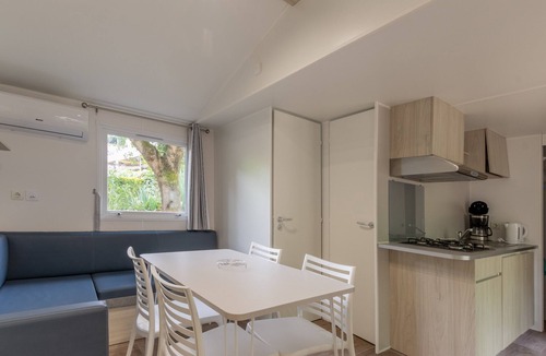 Lavilledieu RV Rental | Mobile Home 'Confort B - 1-6 Pers' with Shared Pool, Private Terrace and Shared Garden