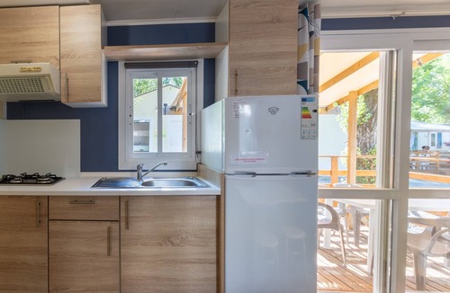 Lavilledieu RV Rental | Mobile Home 'Mobil-home D - 1-6 Pers' with Shared Pool, Private Terrace and Shared Garden