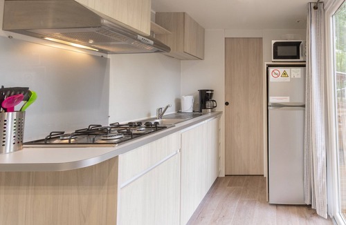 Lavilledieu RV Rental | Mobile Home 'Mobil-home E - 1-6 Pers' with Shared Pool, Private Terrace and Shared Garden