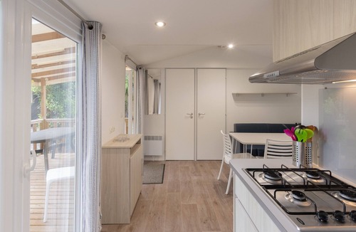 Lavilledieu RV Rental | Mobile Home 'Mobil-home E - 1-6 Pers' with Shared Pool, Private Terrace and Shared Garden