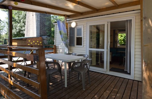 Lavilledieu RV Rental | Mobile Home 'Mobil-home E - 1-6 Pers' with Shared Pool, Private Terrace and Shared Garden
