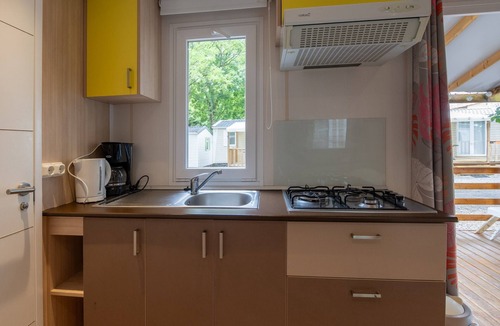 Lavilledieu RV Rental | Mobile Home 'Mobil-home B - 1-4 Persons' with Shared Pool, Private Terrace and Communal Garden