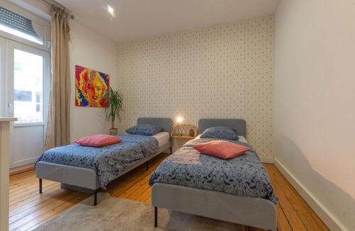 Sablon Apartment | Plumeria - Grand 75m2 calme avec jardin - 2 Chambres - 4 Lits - Parking gratuit