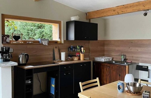 Charnay Ski Chalet | Quiet cottage on the River, large fenced lot, pets welcome!