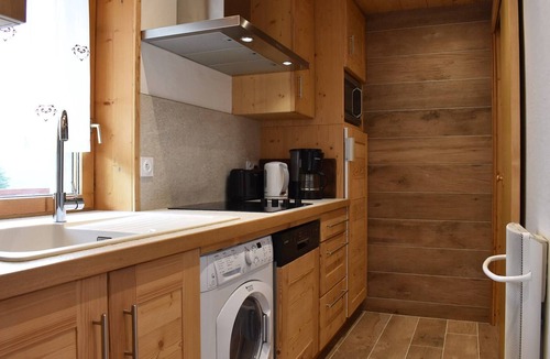 Meribel Centre Apartment | Ski-In/Ski-Out Apartment with Fireplace and Balcony in Méribel