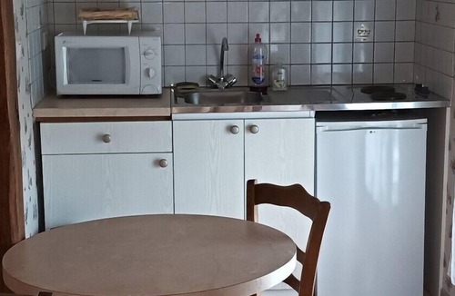 Remoncourt House | Studio with kitchenette and garden view