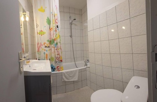 Remoncourt House | Studio with kitchenette and garden view