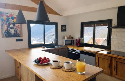 Saint-Paul-sur-Isere Apartment | The Painter's Retreat, a mountain cabin with a breathtaking view.