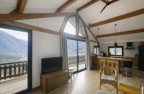 Saint-Paul-sur-Isere Apartment | The Painter's Retreat, a mountain cabin with a breathtaking view.
