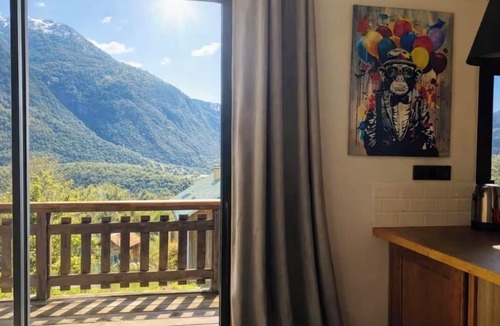 Saint-Paul-sur-Isere Apartment | The Painter's Retreat, a mountain cabin with a breathtaking view.