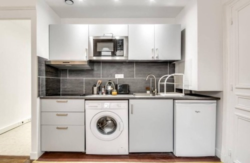 Saint-Gervais Apartment | TRANQUIL LIVING ON RUE RIVOLI: UNVEILING PARISIAN CHIC IN LE MARAIS
