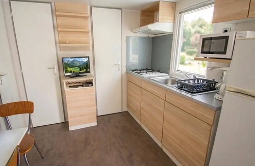 Saint-Honore-les-Bains House | ZEcamping 3 étoiles espace aquatique toboggans mobil-home TV 35m2 7 pers