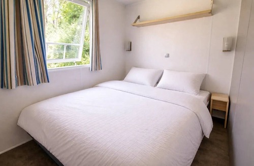 Saint-Honore-les-Bains House | ZEcamping 3 étoiles espace aquatique toboggans mobil-home TV 35m2 7 pers