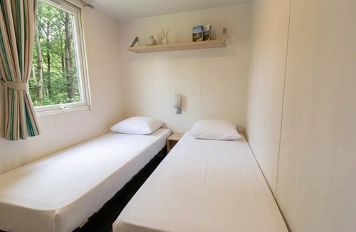 Saint-Honore-les-Bains House | ZEcamping 3 étoiles espace aquatique toboggans mobil-home TV 35m2 7 pers