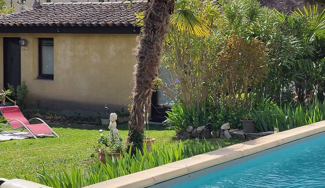 air-conditioned studio in the owner's garden in a village,