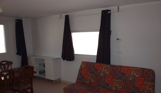 apartment with a large living room and 2 bedrooms, 6 individual beds