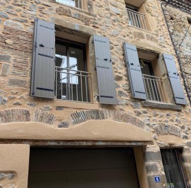 Appartements neufs avec garages dans maison de village