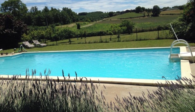 Garden with view, large swimming pool and divided farmhouse