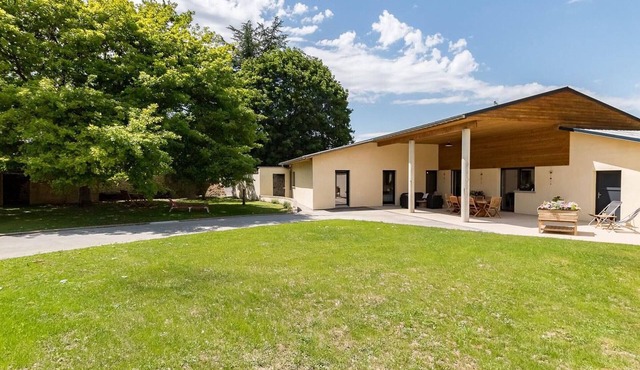 Modern, bright lodging in Gy with spacious living area, garden, and children's games