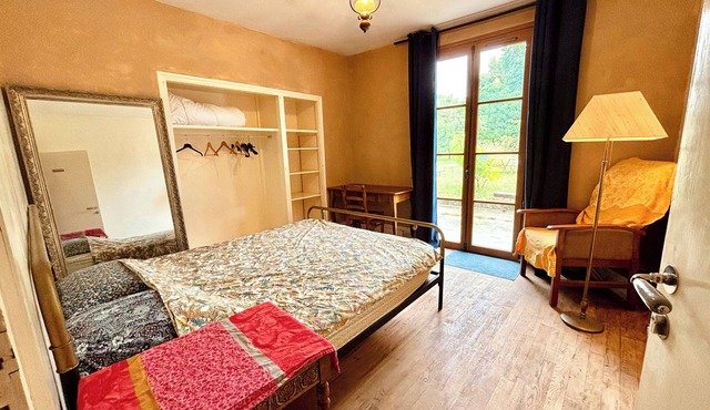 Room overlooking the garden in a shared apartment in a house undergoing eco-renovation