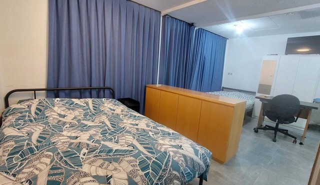 Studio apartment with a kitchen and bathroom