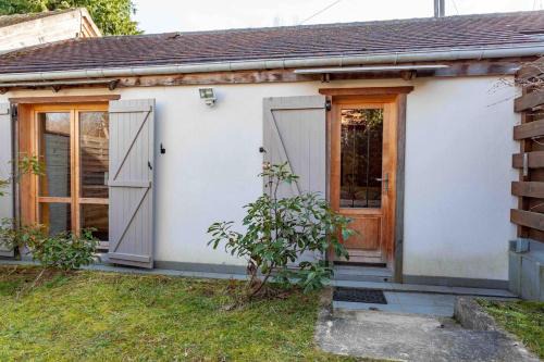 Studio en Bois avec jardin clos