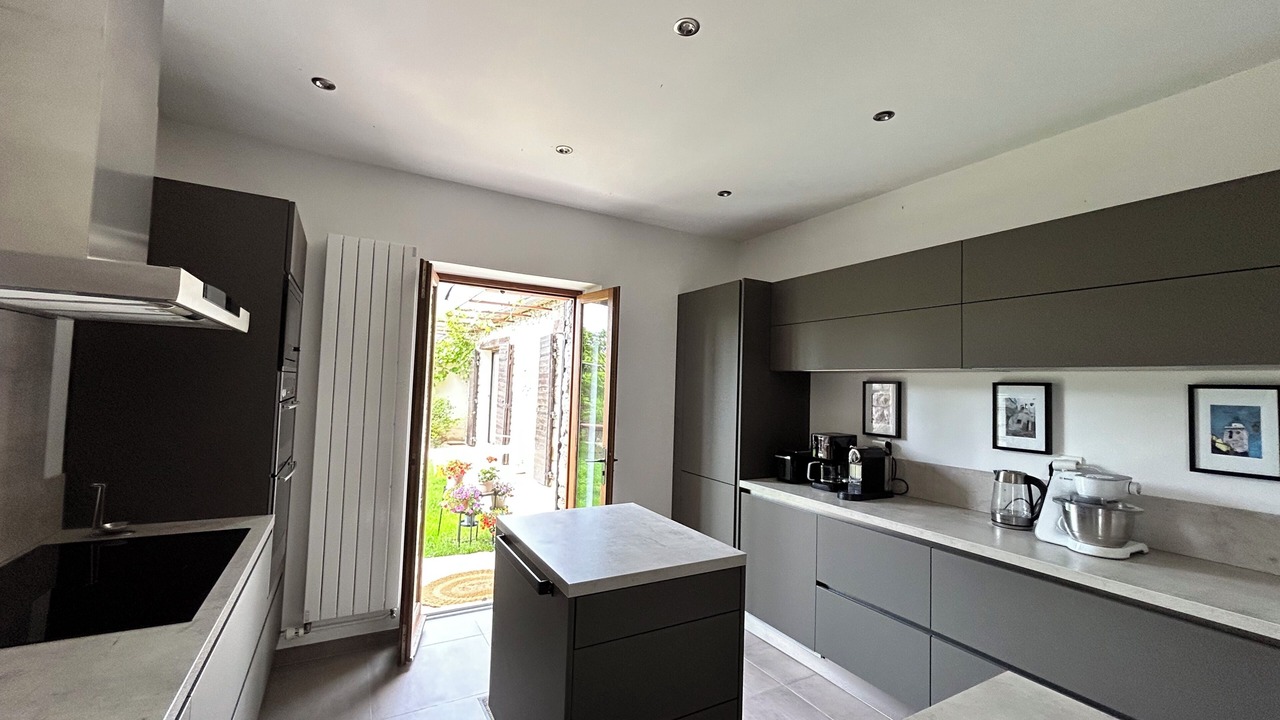 Photo of Kitchen in Le Poet-Sigillat