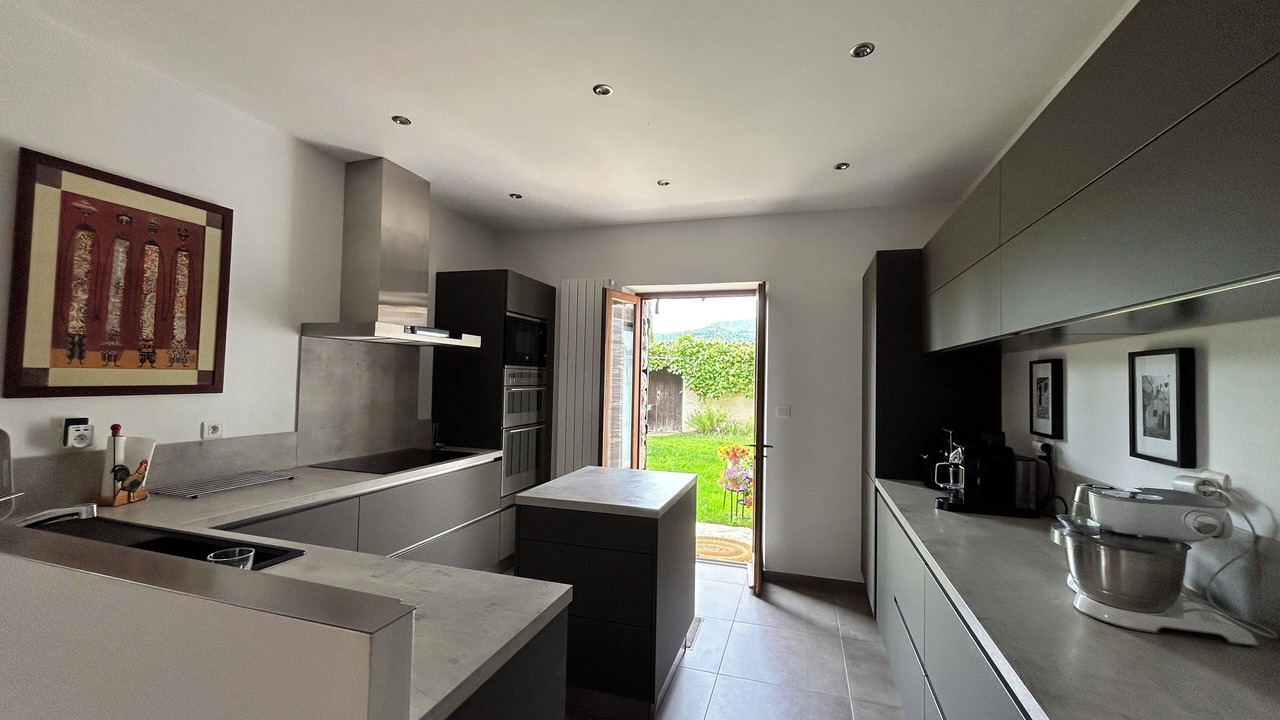 Photo of Kitchen in Le Poet-Sigillat