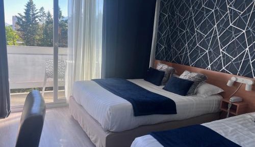 Triple Room (1 Double Bed + 1 Single Bed)
