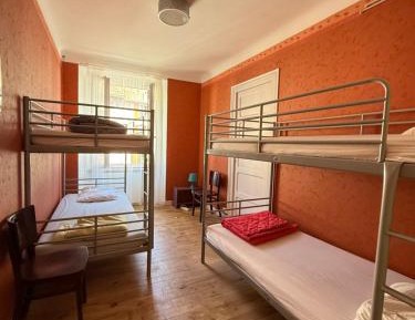 Single Bed in Dormitory Room