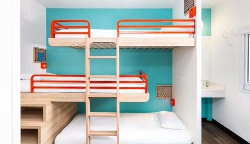 Break Room with Three Single Bunk Beds and Shared Bathroom