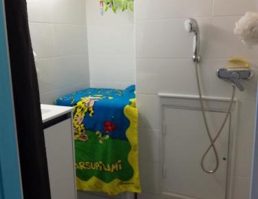 Single Bed in Dormitory Room